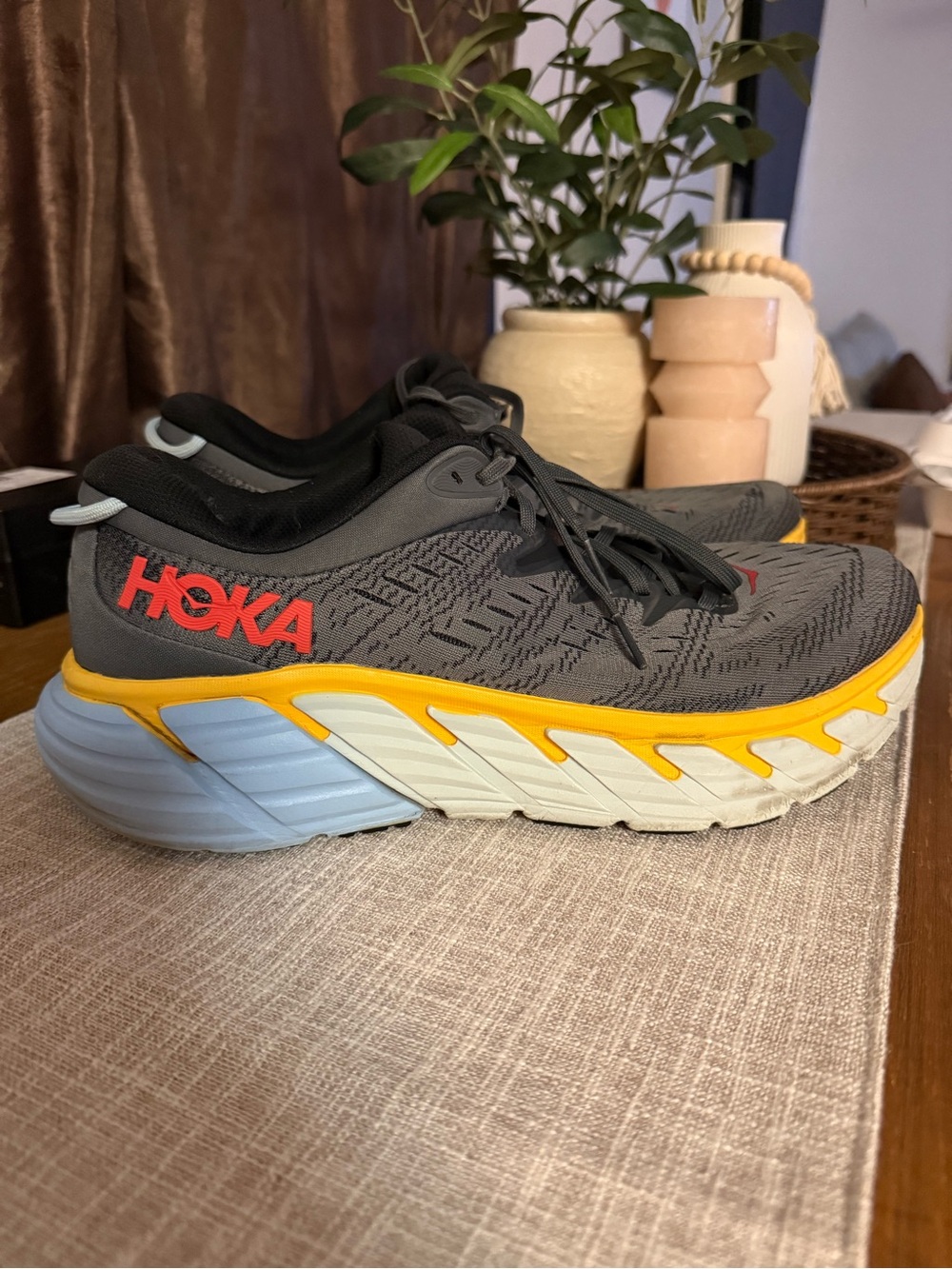 Hoka Men's Gray Athletic Shoes with Yellow and Red Accents